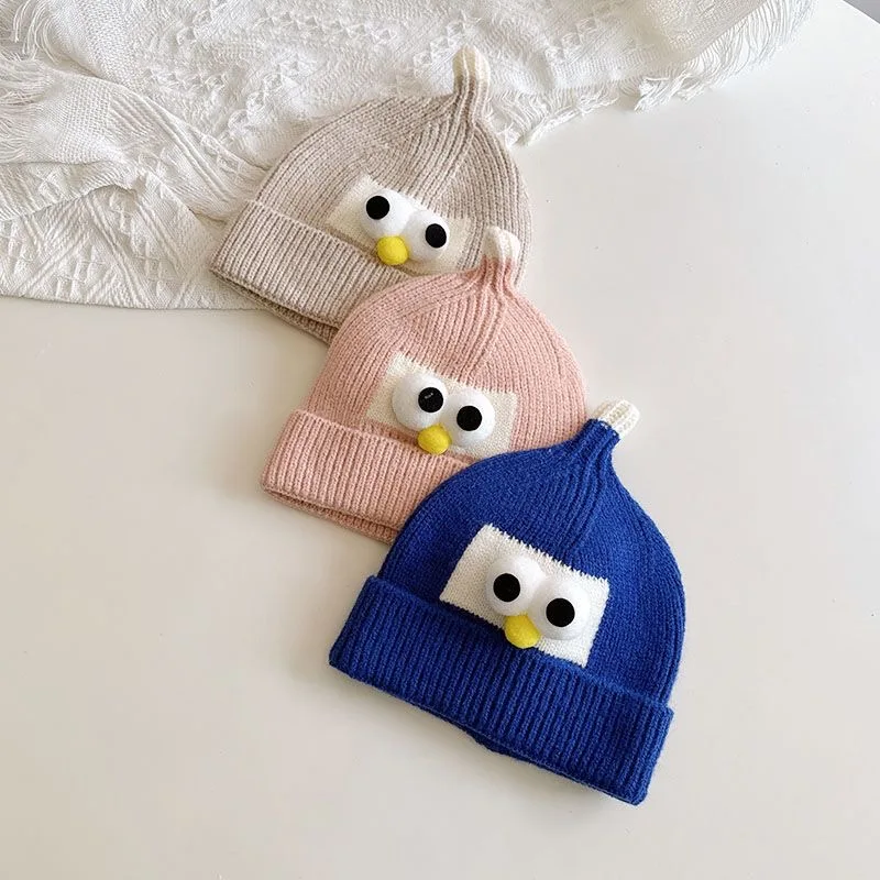 Baby hat fall and winter men and women Korean version of the baby knitted warm wool cap cute super cute eyes children\'s head cap