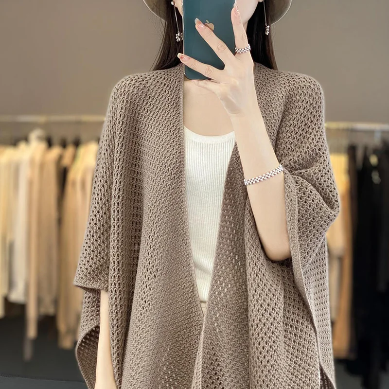 Autumn and winter new 100% pure wool women's hollow shawl solid color knitted cardigan and scarf dual-purpose cloak.