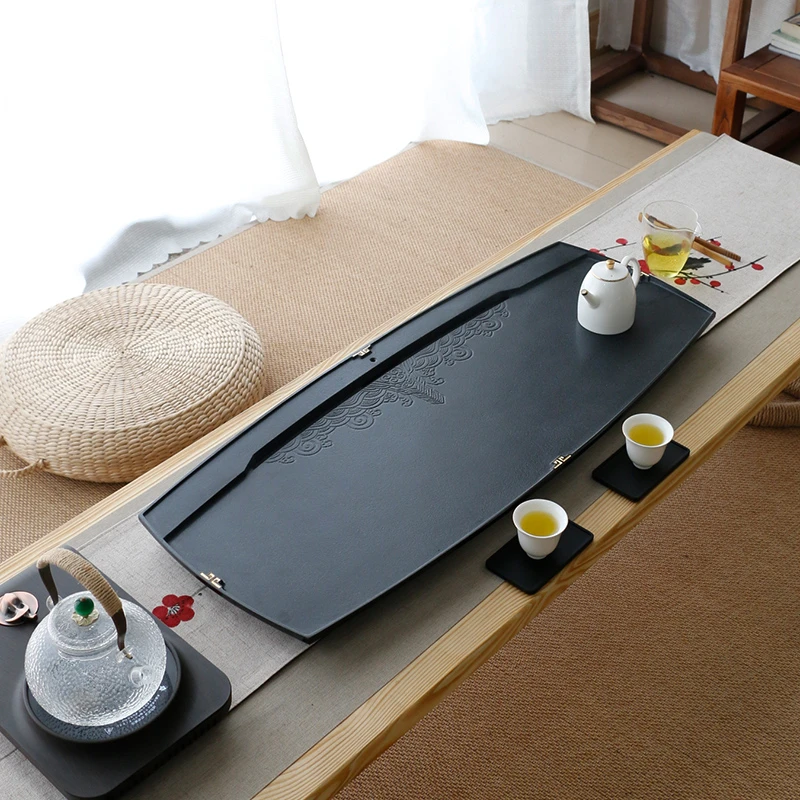 Watching the whole natural black gold stone tea tray hand carved stone tea table stone tea sea household simple tea set