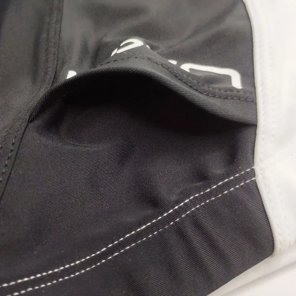 Calzoncillos de baño para hombre, ropa de baño Sexy con bolsillos de parche blanco y negro, pantalones cortos deportivos para agua y playa
