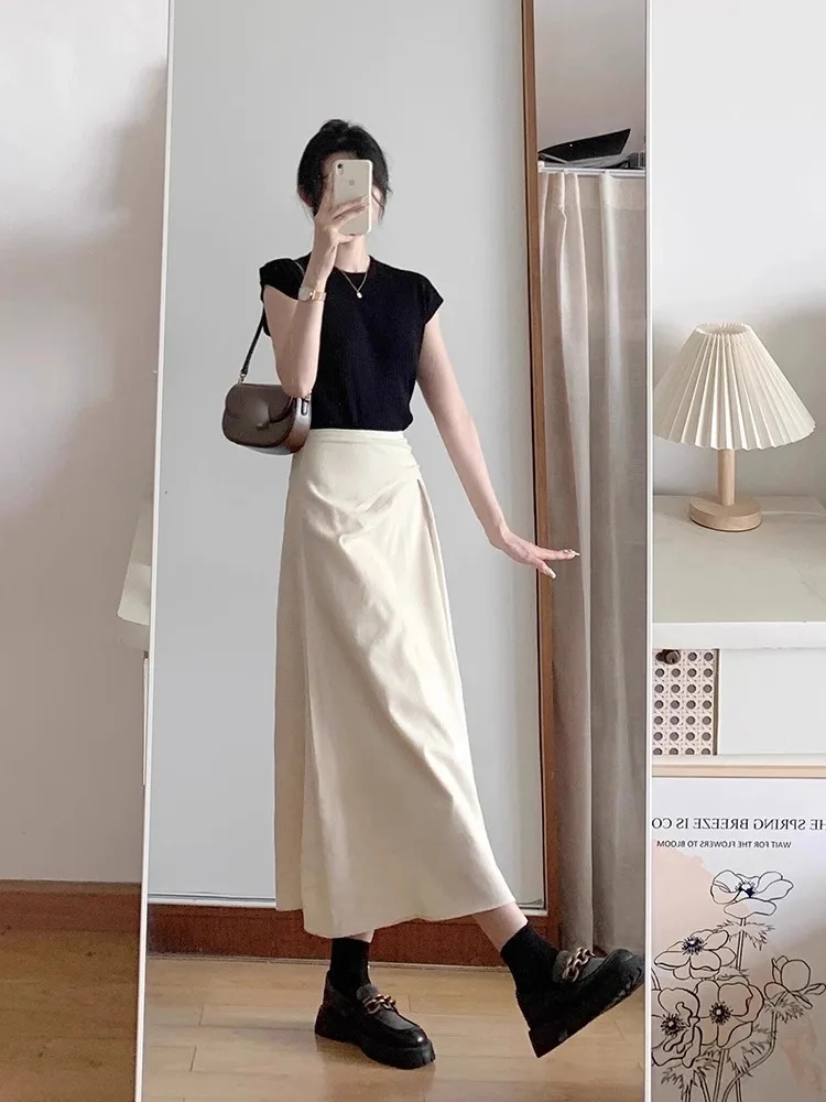 Aprikosenfarbener High-Waist A-Linien-Midirock für Damen, Sommer 2026, dünner, unregelmäßiger, hüftbedeckender Schirmrock, modischer Pack-Hip-Stil – Detail 10