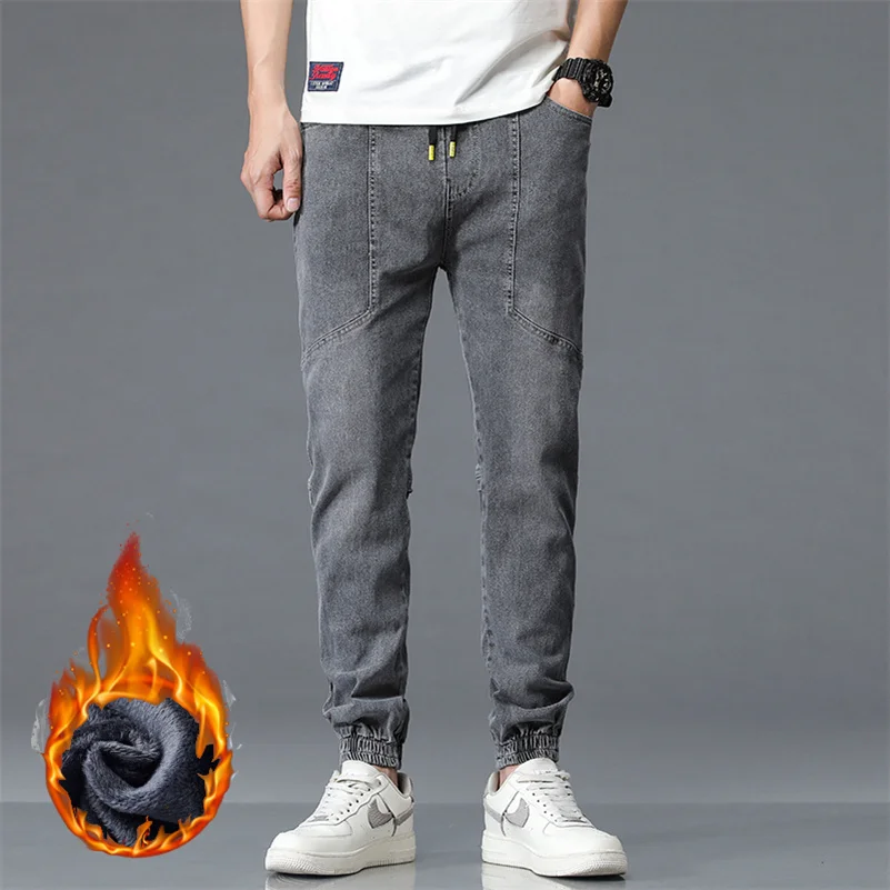 New Winter Men Warm Thermal Black Blue Cargo Jeans Fleece Streetwear Denim Jogger Pants pantaloni larghi Harem in pelliccia spessa Plus Size