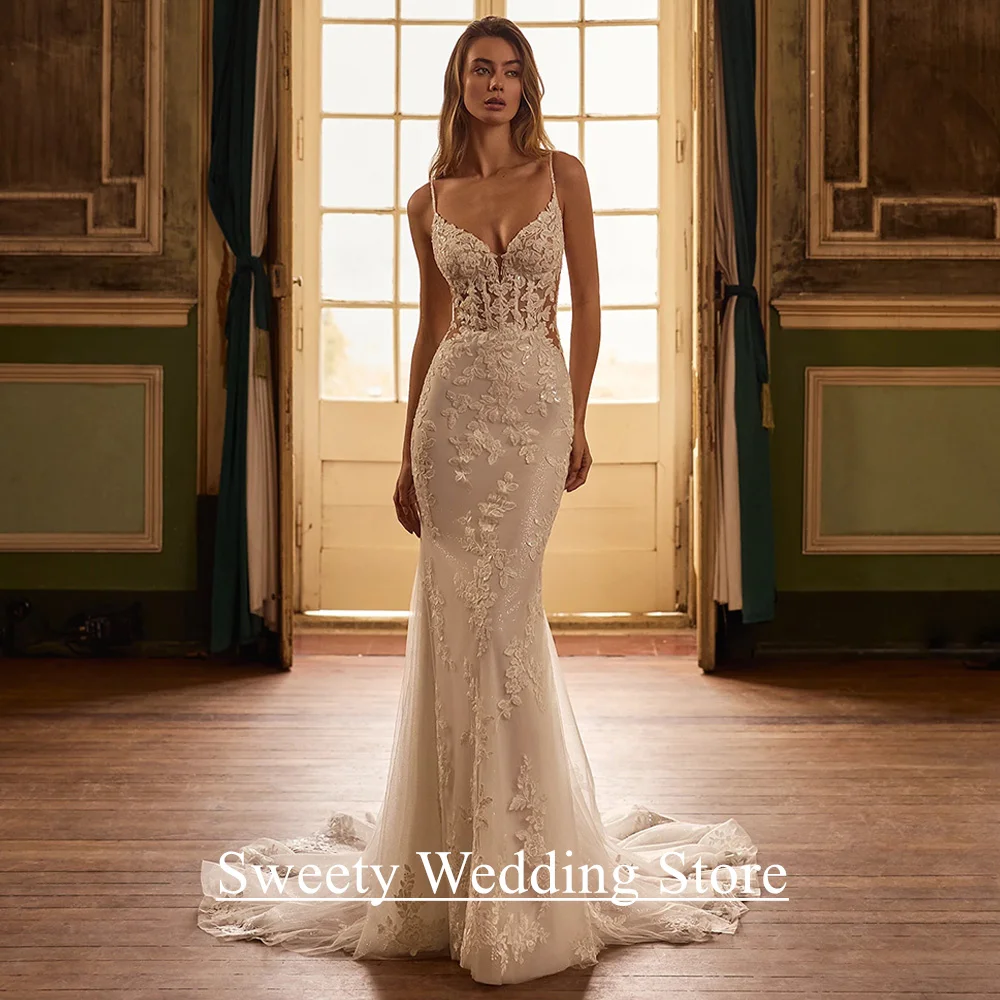 

Sexy Mermaid Wedding Dresses Robe De Mariage Customized Spaghetti Straps V Neck See Through Sequined Applique Bridal Gown