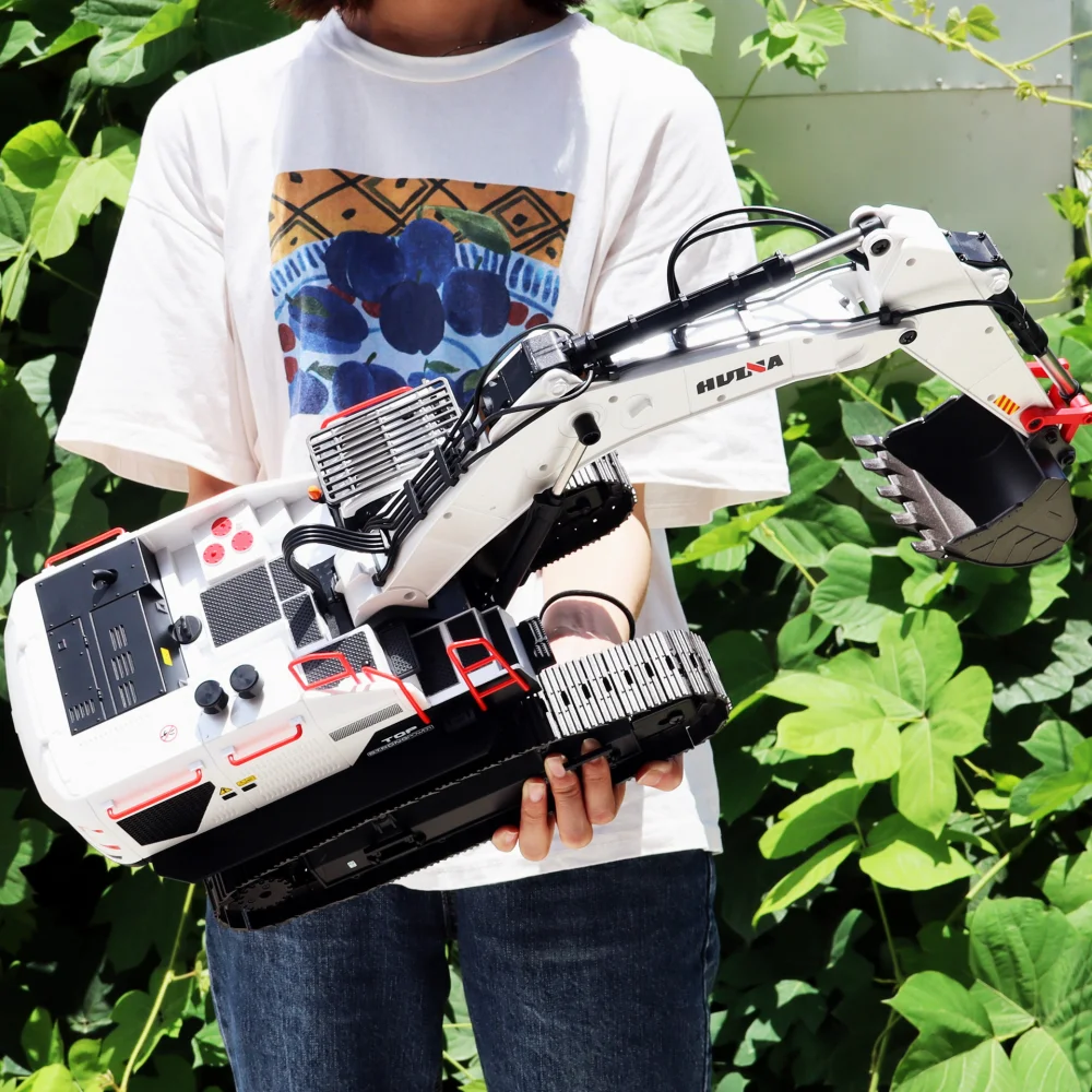 Huina-excavadora a Control remoto de aleación de 594G, máquina de demolición con rotación de 2,4G, recogedor de madera, coche de ingeniería de escalada, 1:14