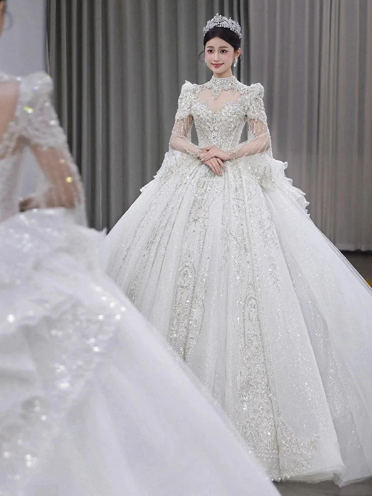 A new long-sleeved heavy-duty luxury haute couture dress with large tail view 4