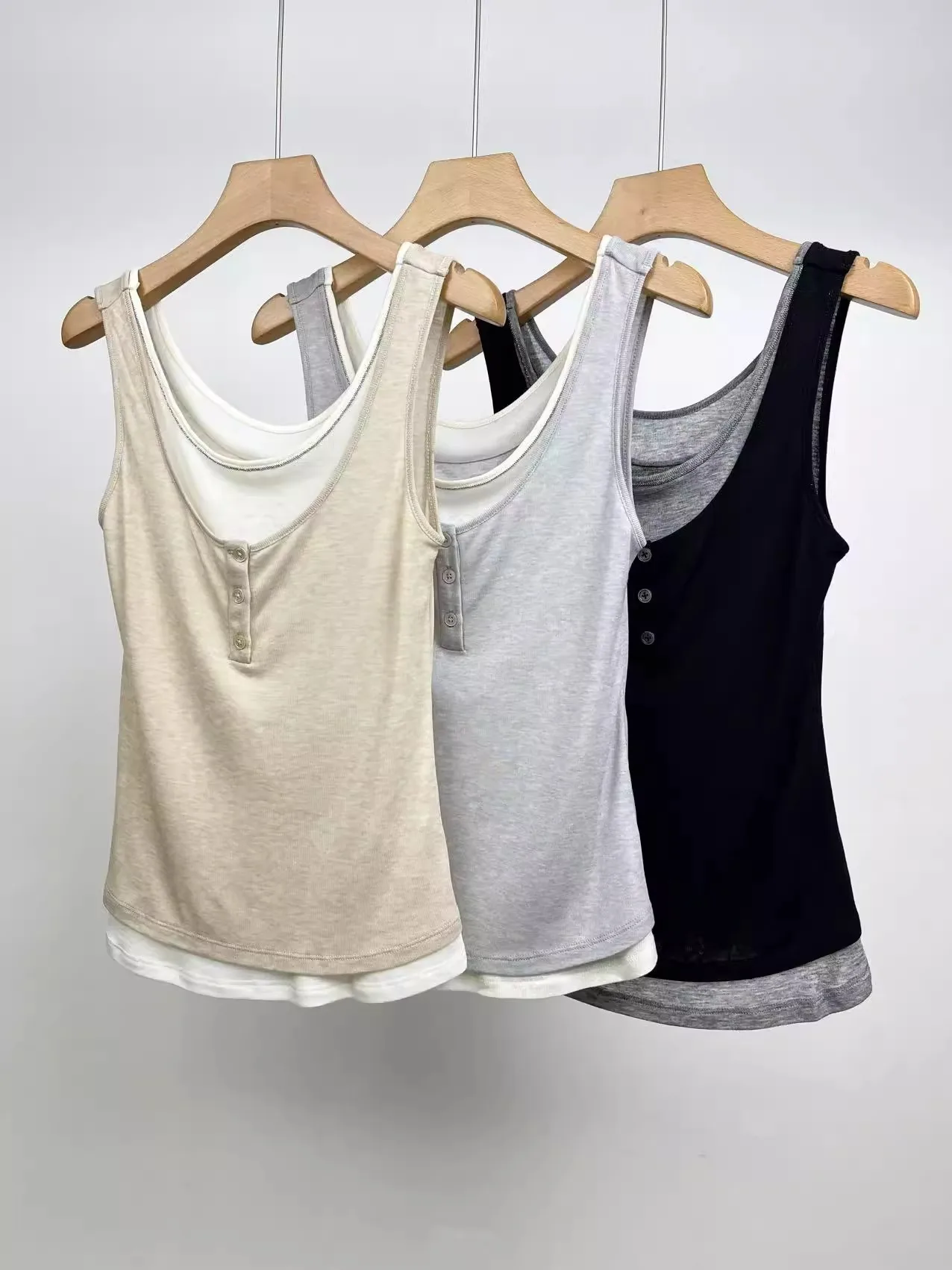 

Light luxury High-end U-necked pearlescent Tencel wool halter top Fake two knitted blouses