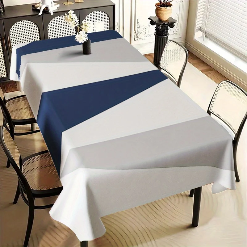 An irregular patchwork tablecloth, a blue and white polyester crepe tablecloth.