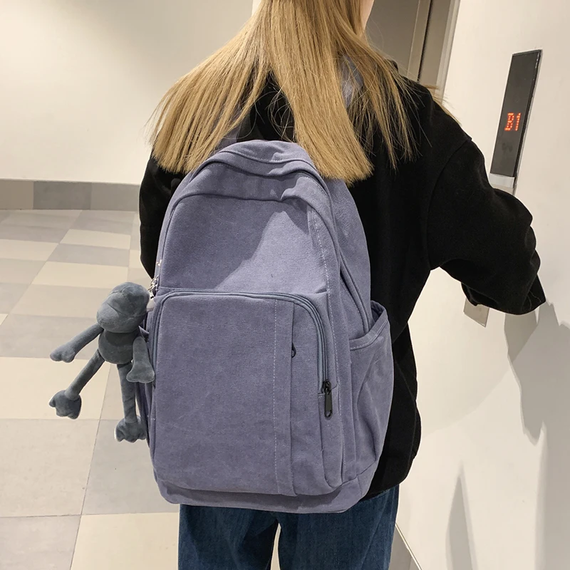 Zaino da donna in tela di alta qualità tinta unita zaino da viaggio di grande capacità zaino da studente Casual di moda per Laptop Unisex