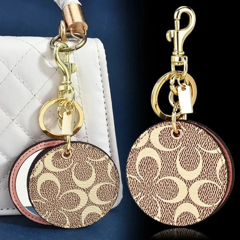 Signature Canvas Mirror Bag Charm Keychain Pink Leather Compact Hidden Mirror for Quick Makeup Touch Up Stylish Daily Accessory