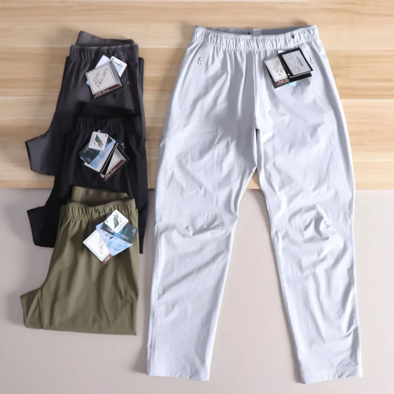

Techwi мужские летние тонкие уличные водонепроницаемые дышащие спортивные повседневные брюки с прямыми штанинами на молнии средней талии, длинные брюки...