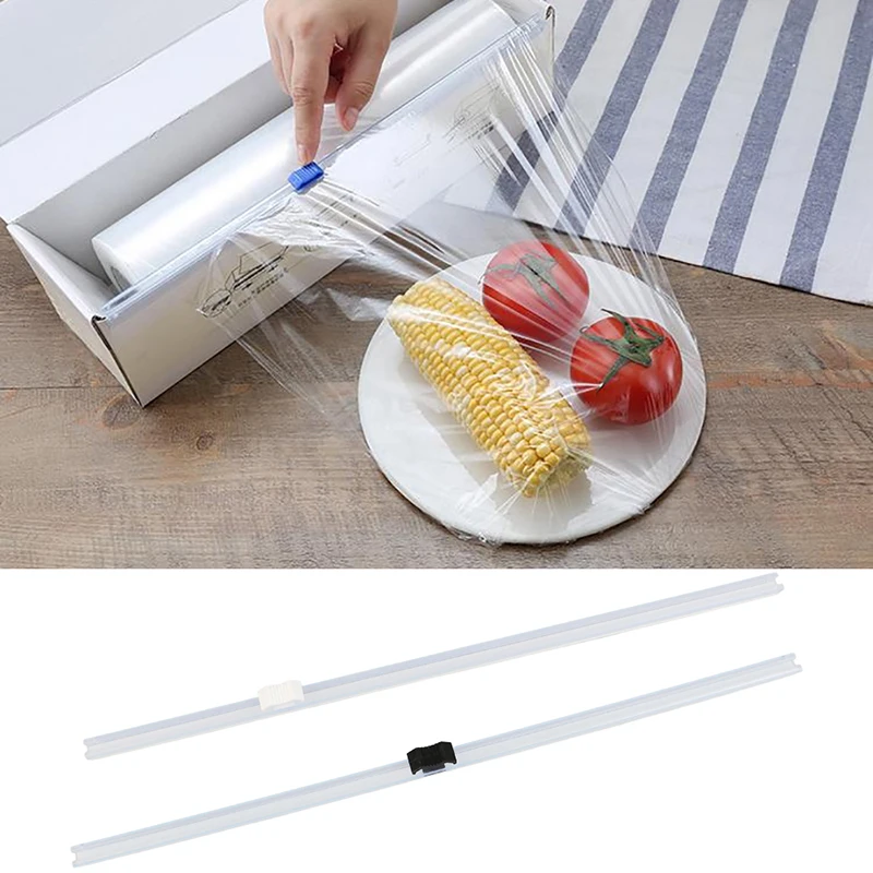 Dispenser per involucro di plastica e taglierina per pellicola per alimenti parte per taglierina per pellicola trasparente