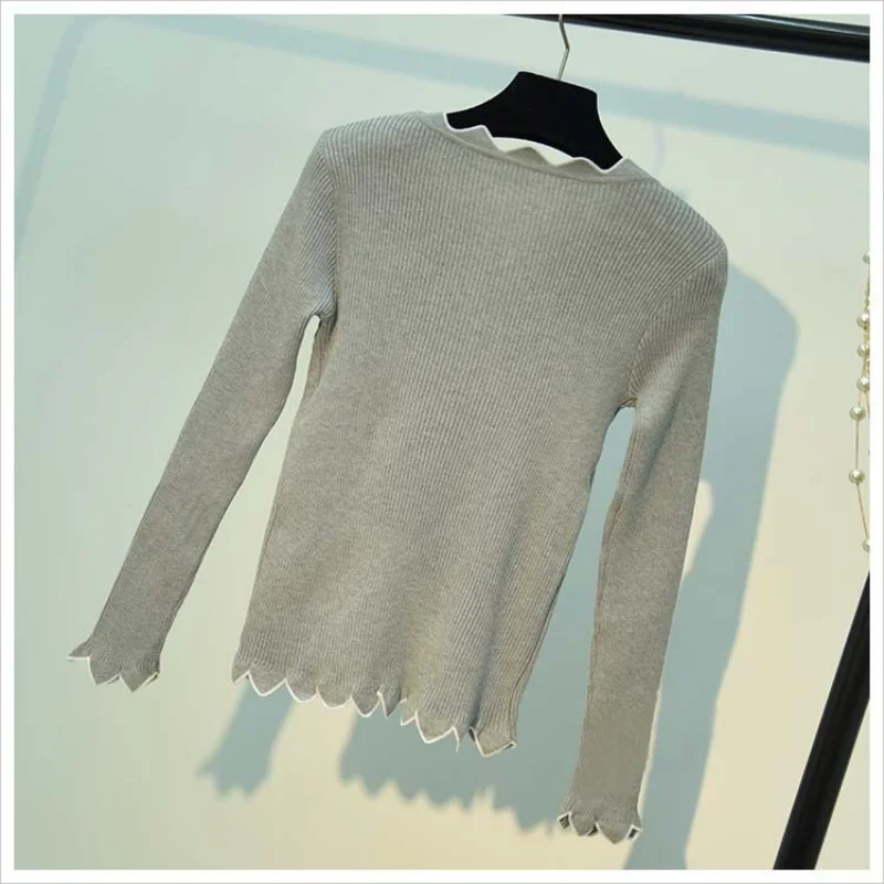 Autumn and winter new solid color all-in-one bottom pullover wooden ear lace round neck wave sweater sweater long sleeve woman