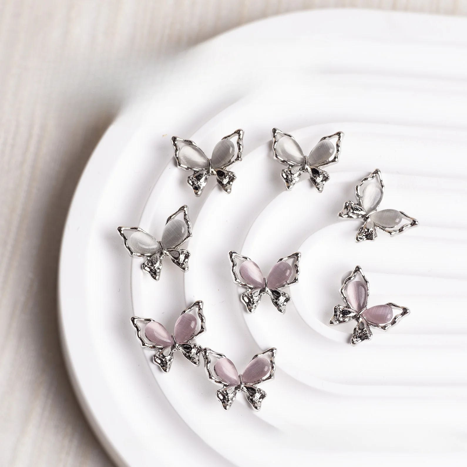 10pcs Pink Rhinestone Cat Eye Alloy Nail Art Accessories with 3D Hollow Out Diamond Butterfly Decorations