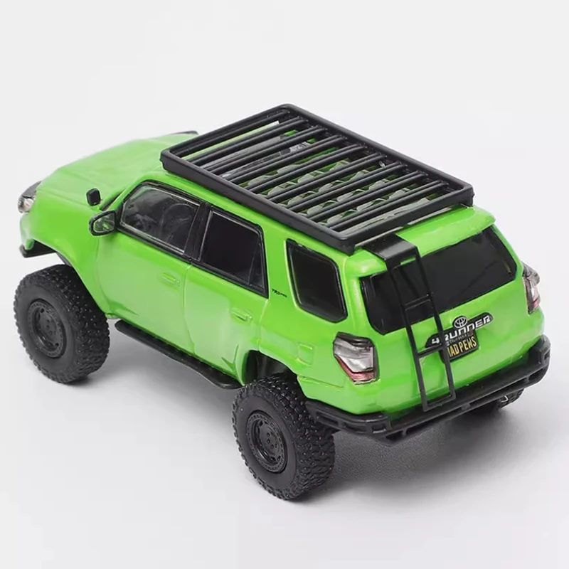 GCD Diecast 1:64 مقياس 4 عداء نسخة معدلة للطرق الوعرة مع ملحقات سبيكة محاكاة نموذج سيارة مجموعة عرض هدية