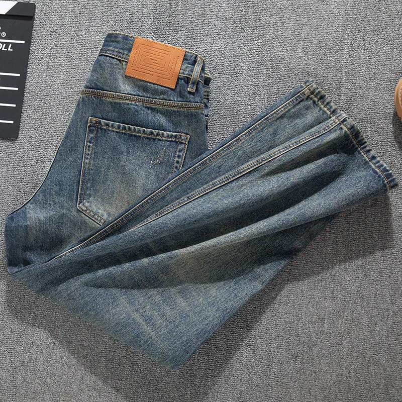 Jeans retrò da uomo a tubo dritto larghi alla moda primaverili ed estivi con fori strappati, giunture con toppe e pantaloni in denim patchwork