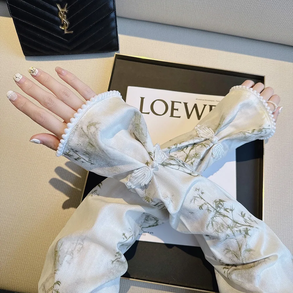 

New Chinese style buckle sun protection ice sleeves with bamboo print and loose fit sleeves in Chinese style