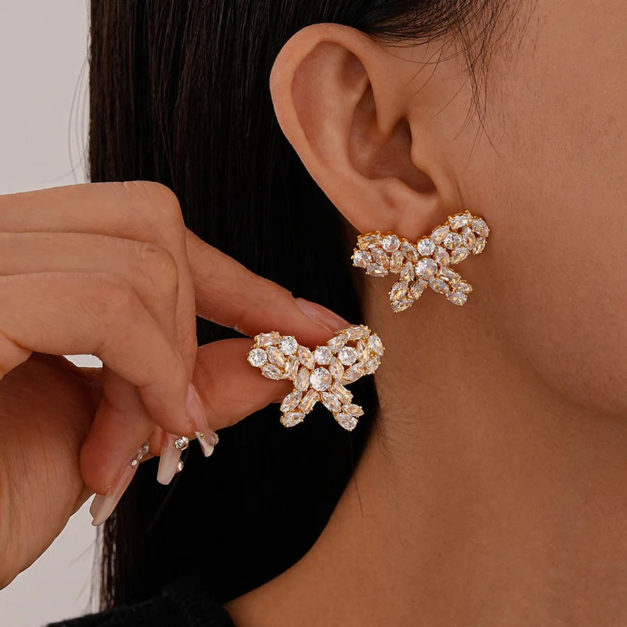 Exquisite zircon butterfly silver needle earrings, real gold electroplating, simple light luxury commuting temperament, high-end