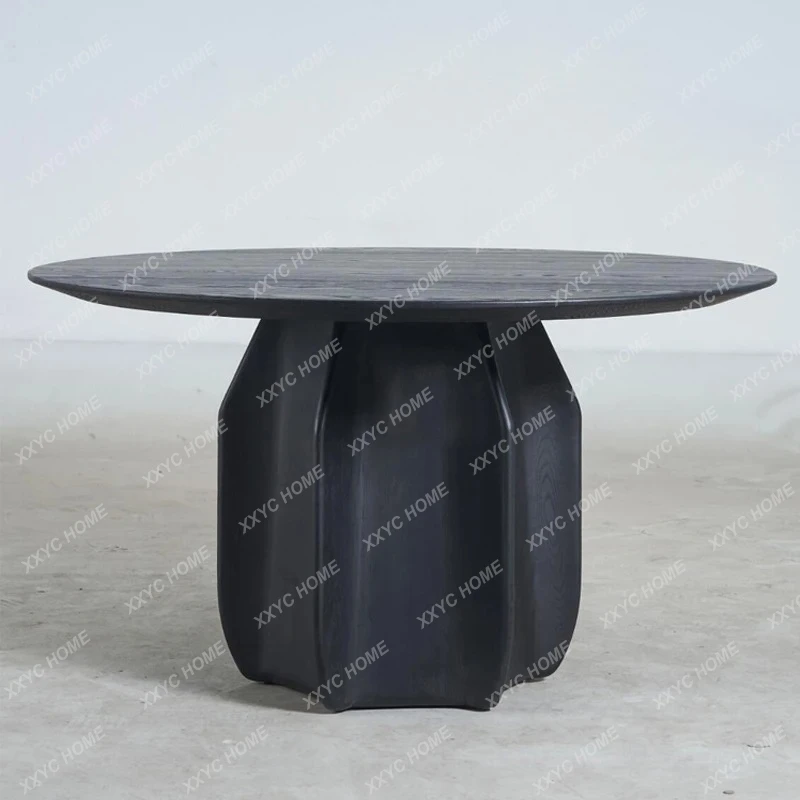 

Medieval light luxury round solid wood dining table retro black high-end cactus round table eating table