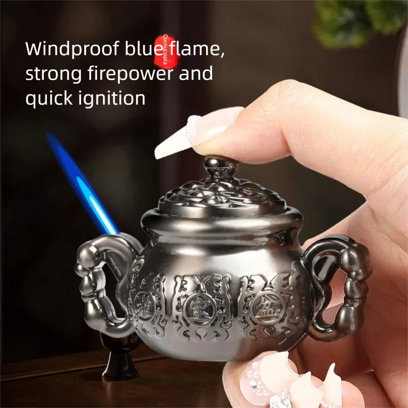 Metal material straight blue flame trendy toy design, playing with the rotating decompression lighter of the treasure pot