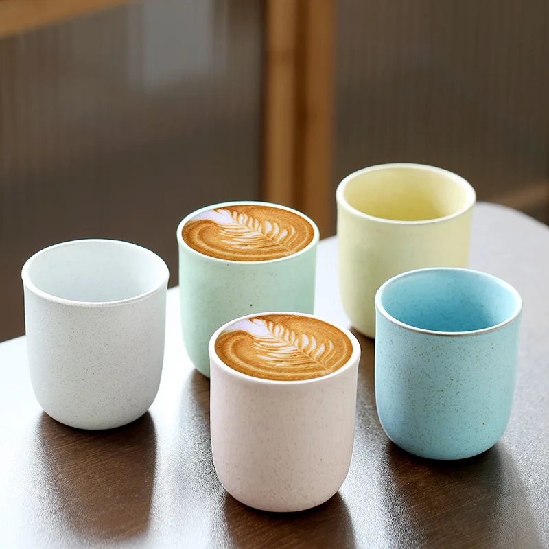 Ceramic Nordic-style matte-glazed coffee cup with a flat base, perfect for enjoying iced tea.