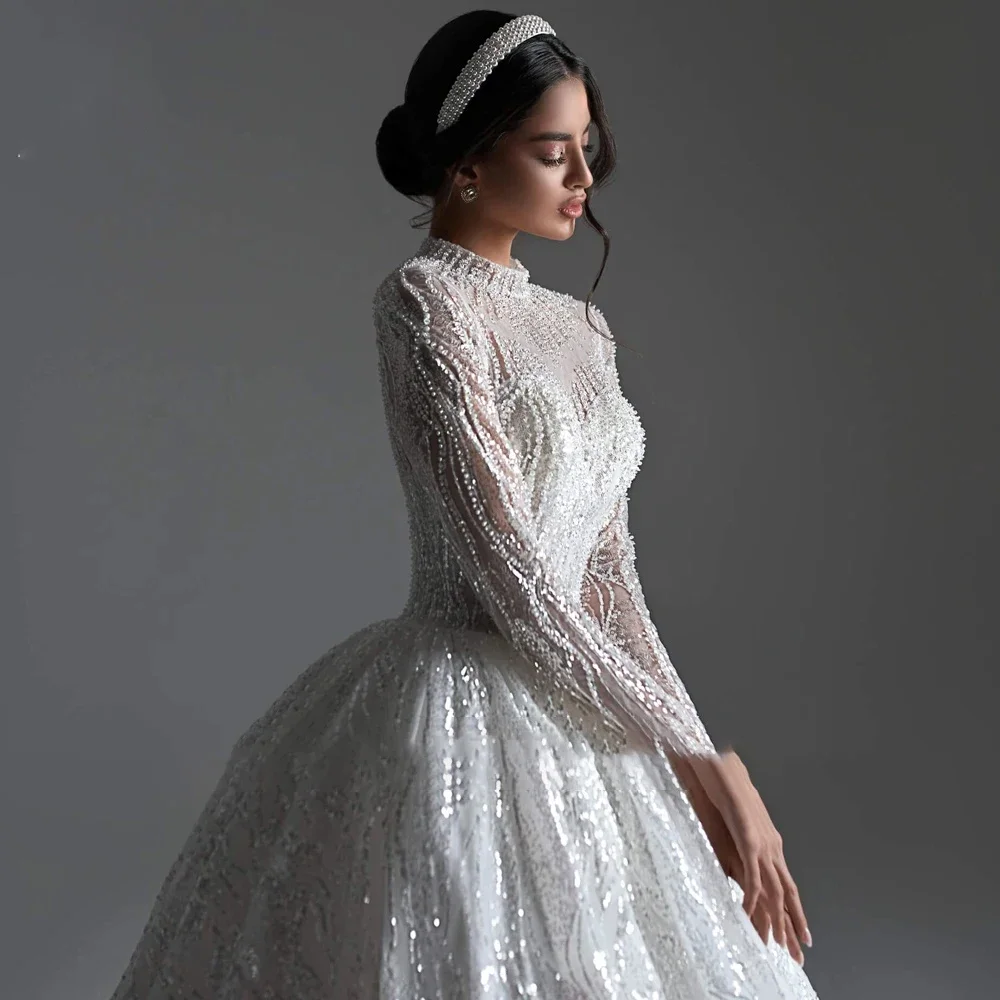 Abito da ballo di lusso personalizzato Abito da sposa Manica lunga alta Scollo a V Abiti da sposa Applicazioni in pizzo Abbigliamento da donna con perline