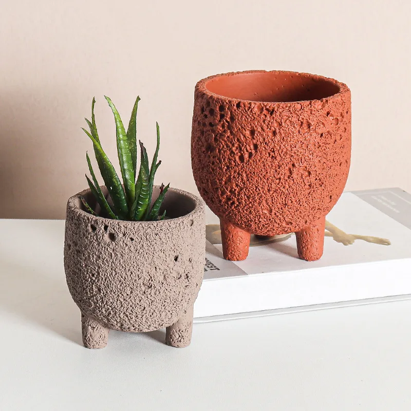 Maceta de cemento con diseño de superficie lunar, estilo nórdico, creativa y sencilla, para plantas suculentas de interior, con tres patas.