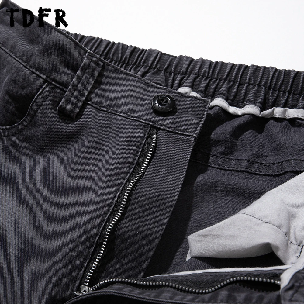 ウォッシュド加工のダメージ加工プリーツカーゴパンツ メンズ スプライス レトロ サファリスタイル ゴムウエスト ワイドレッグ バギーパンツ