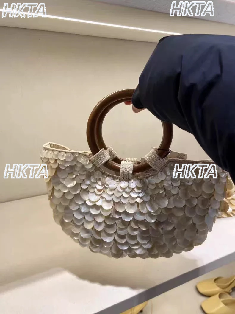 Elegante 2025 verão novo artesanal natural bege concha saco para senhoras moda nicho personalidade na moda bolsas femininas