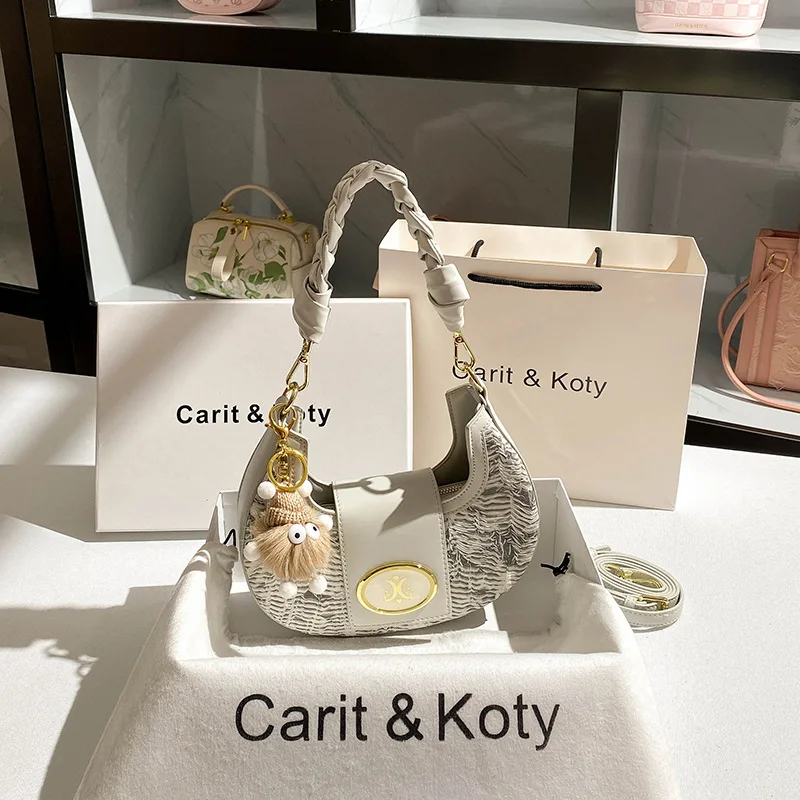 

Niche crescent bag 2025 new high-end hand-woven armpit bag wholesale