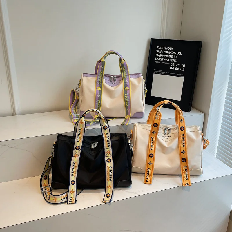 

2026 новейшая модная универсальная ручная дорожная сумка с надписью, сумка через плечо, повседневная сумка для багажа Handbabgs