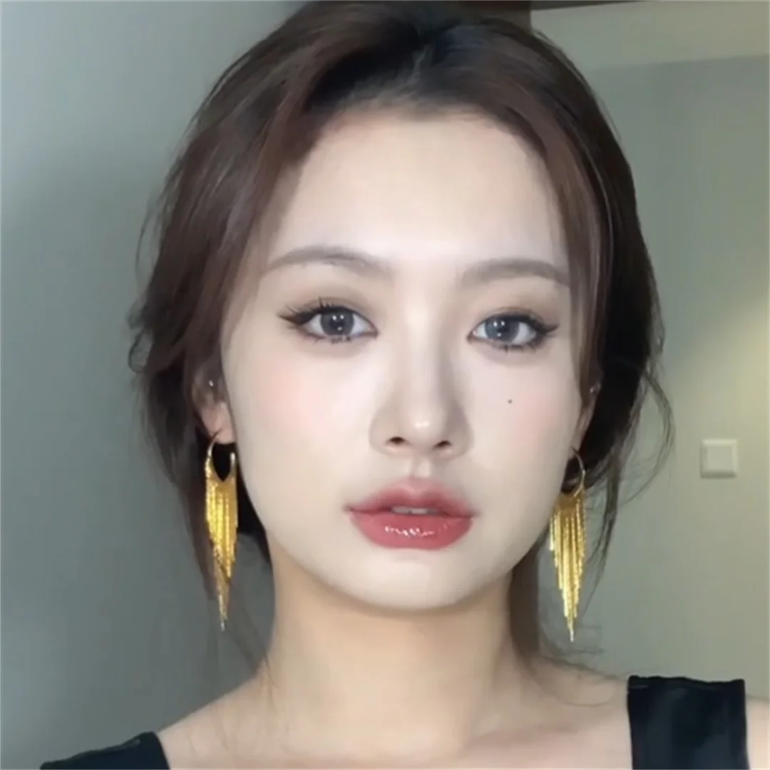 

Gold long fringed earrings women's retro temperament cold wind studs