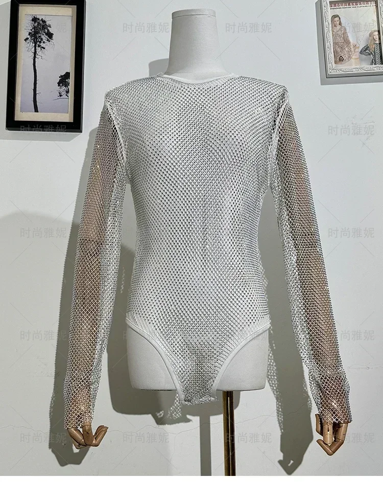 Moda sexy desempenho roupas malha oco macacão em torno do pescoço perspectiva manga longa camisa de fundo brilhante para mulher