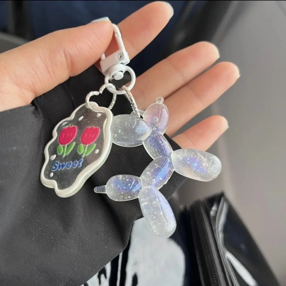 LLavero de perro que brilla en la oscuridad para mujer, decoración de bolsa de dibujos animados, llavero de cachorro con dijes de flores, regalo de