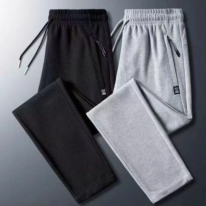 

2024 Spring and Autumn New Fashion Solid Color Waffle Sweatpants Men's Casual Relaxed Comfortable Breathable Large Size Pants