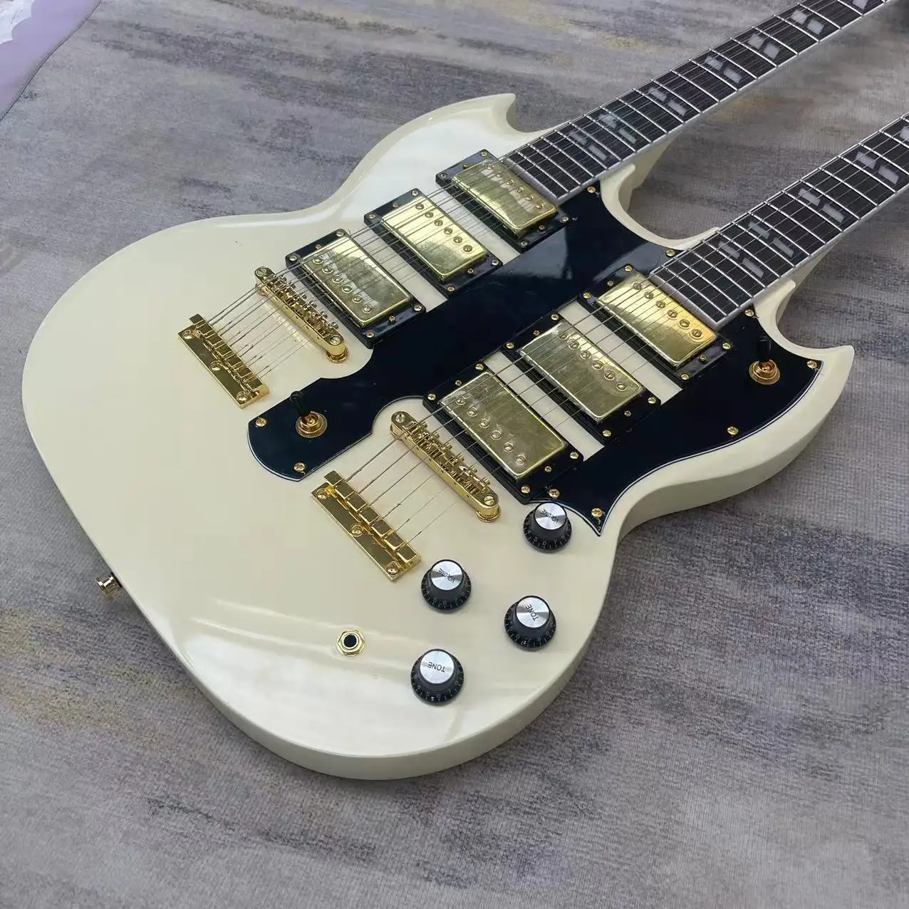 In stock, 12+6 chord double path electric guitar with a milky yellow body. Real pictures of the shipped product. Orders will be