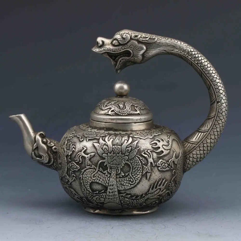 

Collection Chinese Tibetan Silver Hand-Carved Dragon Teapot