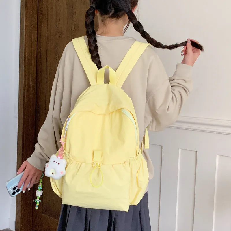 2026New minimalist-style backpack for women, Korean version, lightweight, waterproof, large capacity, suitable for school, casua