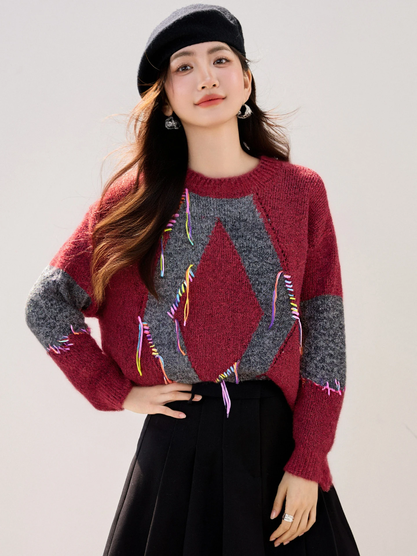 

Color-Blocking And Patchwork Knitted Sweater For Women In A Laid-Back Winter Style Is Loose And Slimming With A Round Neck