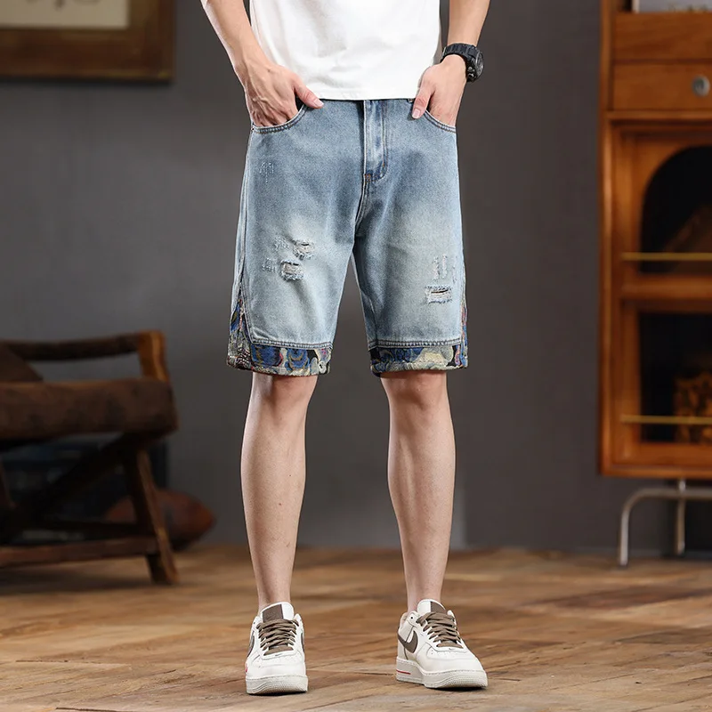 Celana pendek DENIM ไฮสตรีทสำหรับผู้ชายชุดอเนกประสงค์ผ้าบางผ้ายืดสีฟ้าอ่อนอินเทรนด์สำหรับฤดูร้อนกางเกงขาสั้นปักทันสมัย