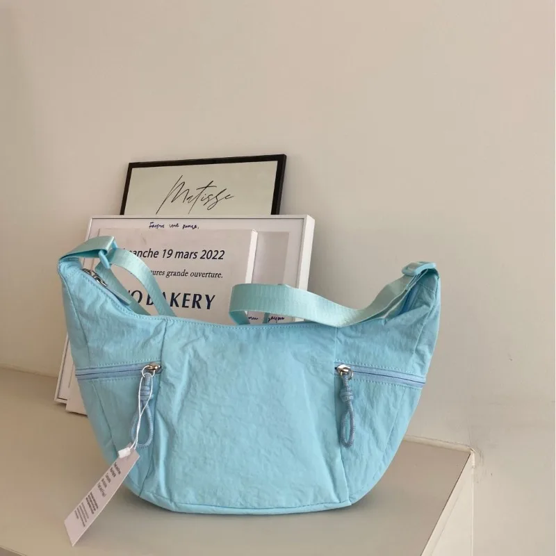 2026 new 6L fashionable casual nylon lightweight dumpling bag shoulder bag large capacity commuting crossbody bag cow horn bag