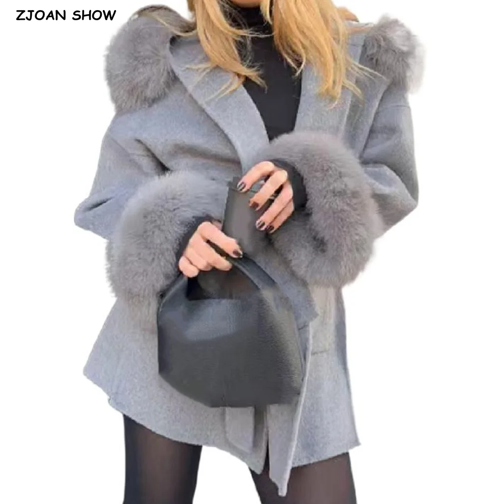 

2025 Осенне-зимнее серое пальто с капюшоном из искусственного меха, длинное шерстяное пальто, женское свободное пальто с завязками и бантом, поясом с боковым разрезом и длинными рукавами, верхняя одежда