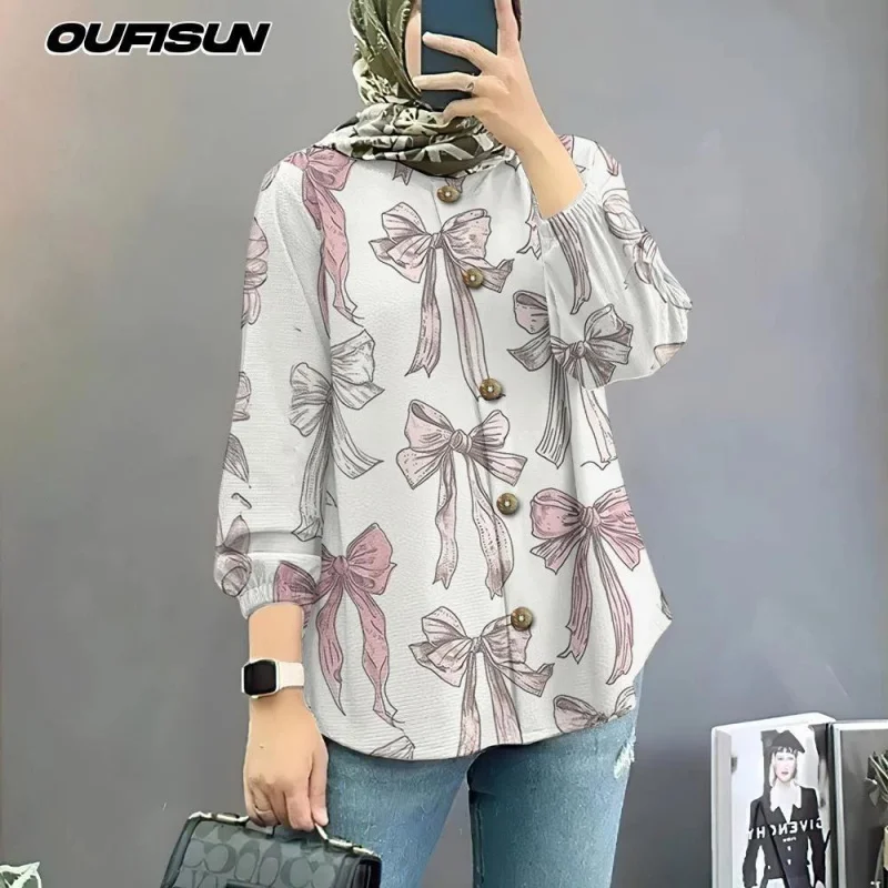 เสื้อเชิ้ตมุสลิมขนาดใหญ่พร้อมผูกรูปผีเสื้อเสื้อเชิ้ตแขนยาวสไตล์หวานแขนพัฟราคาถูก 2025 เสื้อฤดูร้อน