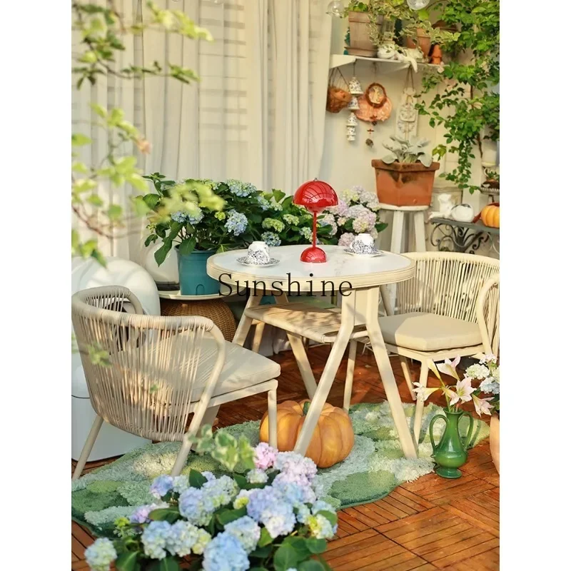 

Cream wind reading casual tea table can be stored rattan chair three-piece garden outdoor table and chairs