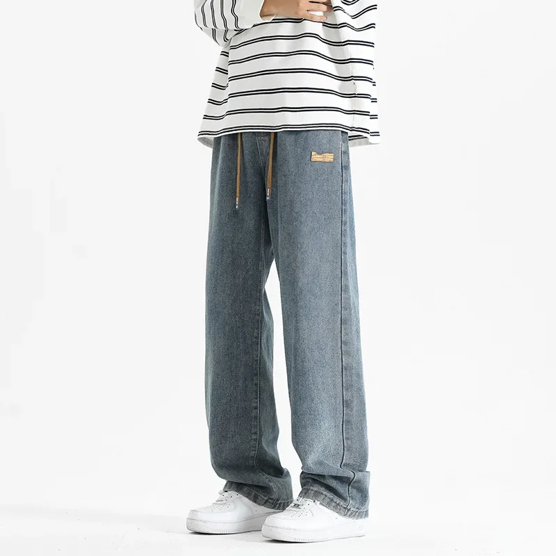 

Новые модные мужские джинсы 2025 года в винтажном стиле: повседневные, трендовые, свободные, широкие, однотонные, с завязками, простые базовые джинсовые брюки