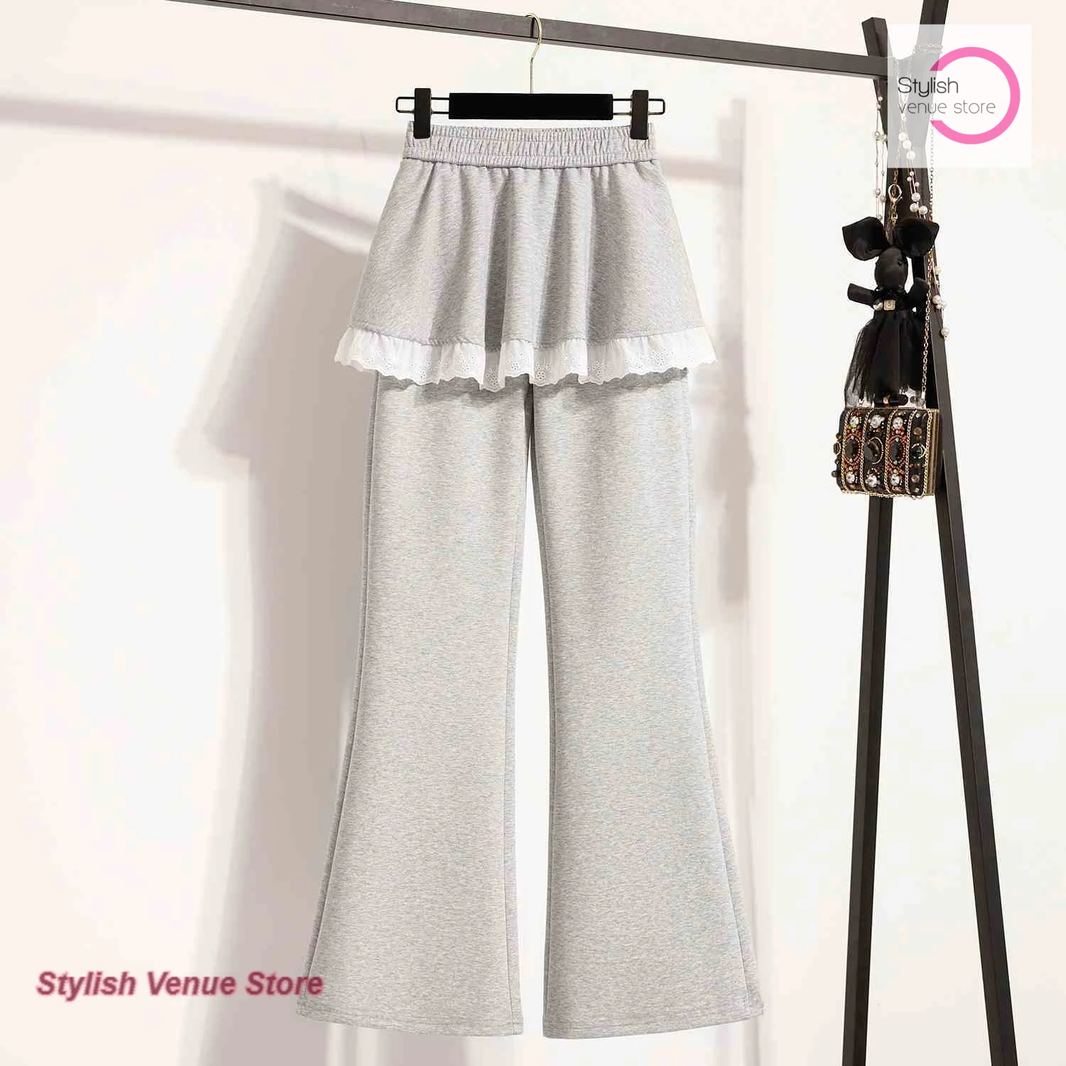 

Korean lace pants female spring and autumn fake two fart curtain pants new skirt pants plus size loose slim bell bottoms.