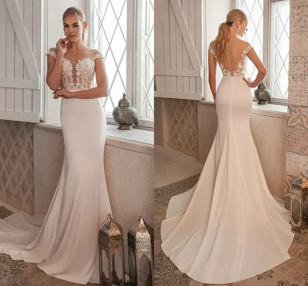 

Elegant Mermaid Wedding Dresses 2024 Lace Sweep Train Appliques Cap Sleeves Illusion Buttons Back Boho Bridal Gowns