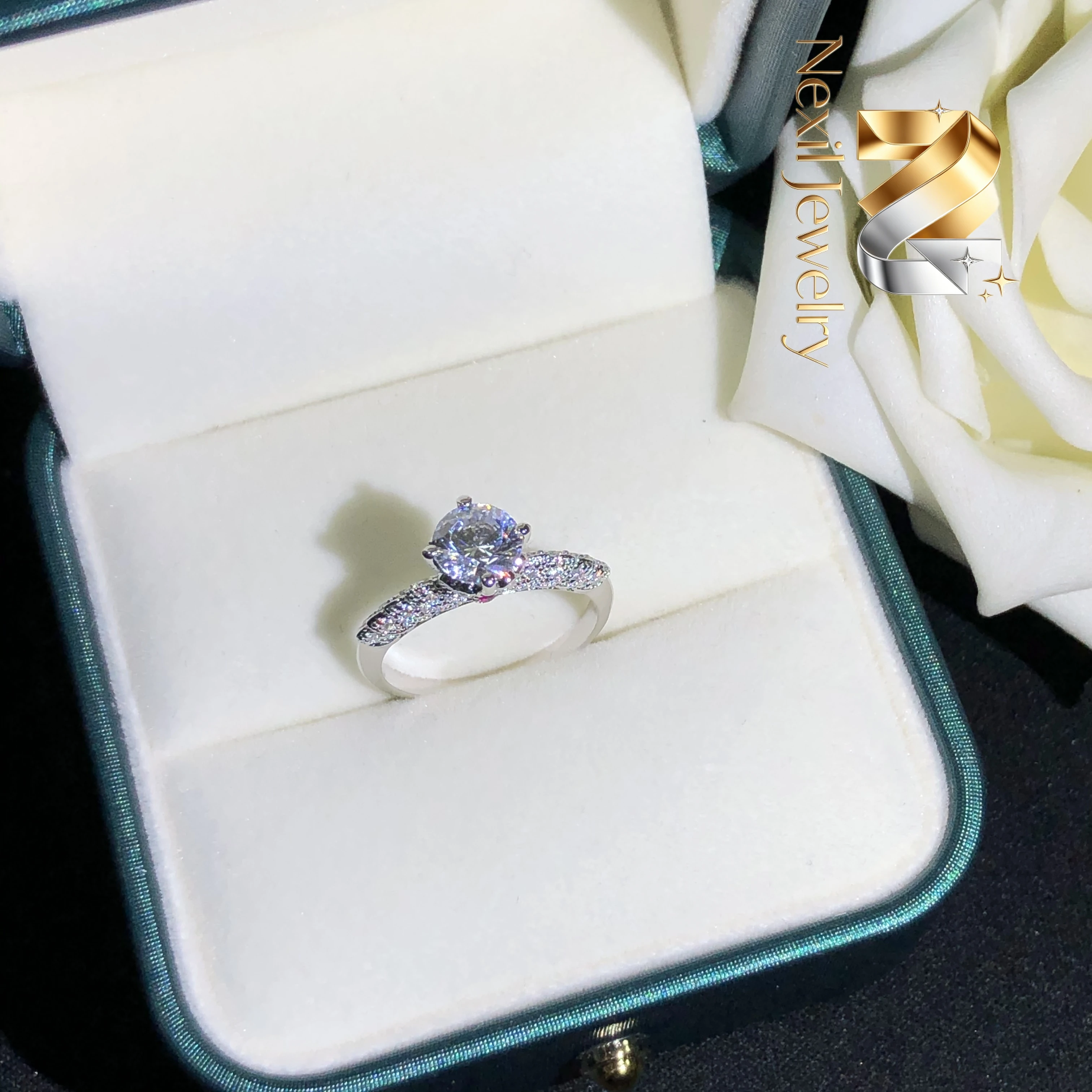 

Nexil Jewelry 1Ct Round Cut 6.5mm D VVS1 Moissanite Diamond Engagement Ring Solid 18K White Gold Jewelry for Women AU750 Weddi