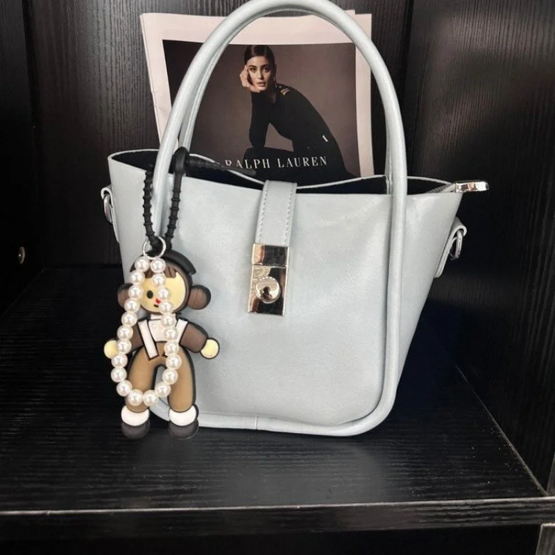 

Трансформируемая сумка-ведро для женщин. Универсальная дизайнерская кожаная сумка через плечо на шнурке. Регулируемый ремень. Для универсальности.