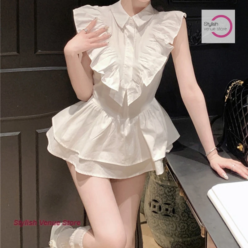 Conception française sens douce épicée fille chemise à volants robe femme été nouveau tempérament doux petites manches volantes taille jupe.