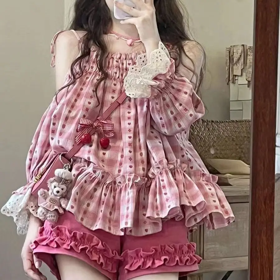 

The sweet and youthful forest-style strappy off-the-shoulder plaid top for summer is a new fashion streetwear for girls in 2025